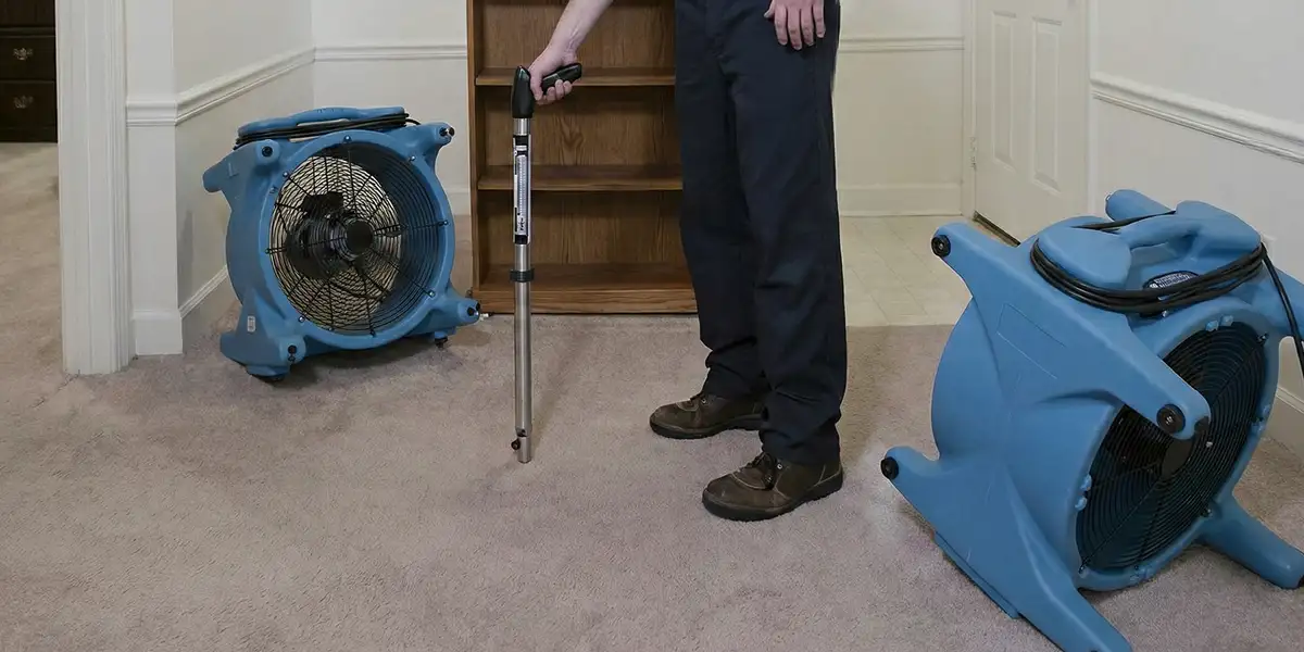 emergency water removal equipment deployed to dry a flooded residential interior in Sacramento, CA